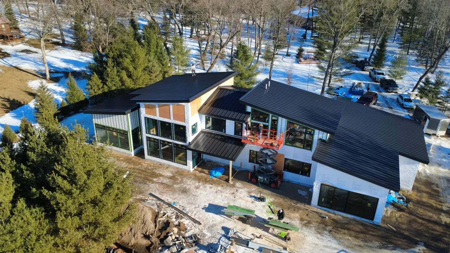 Collins Roofing — matte black standing seam install in Grand Rapids, MN