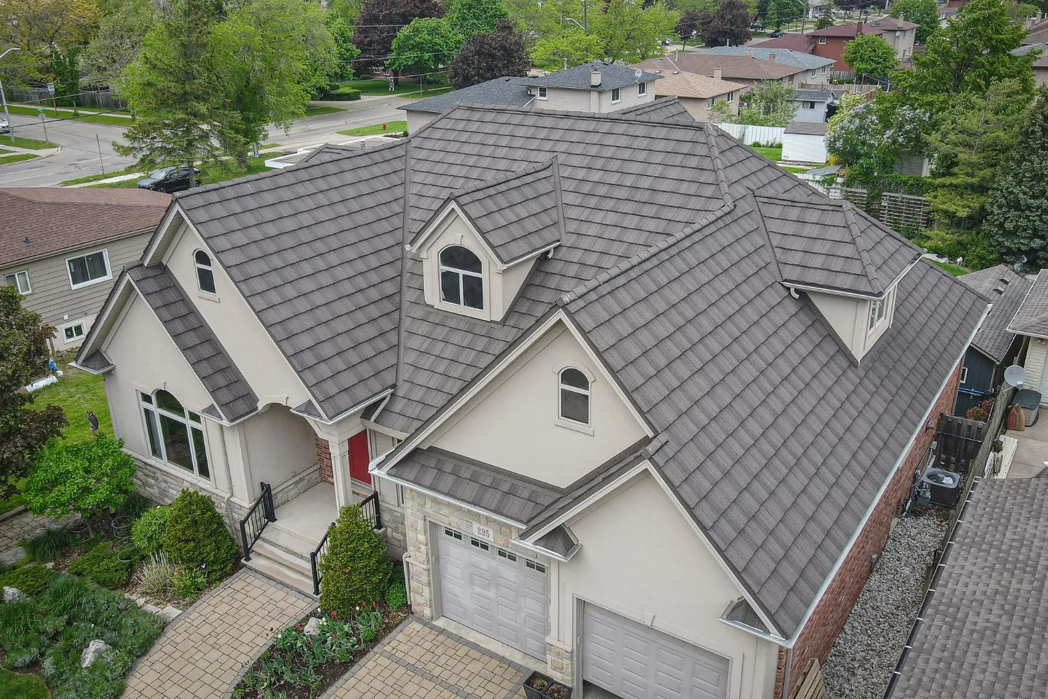 Collins Roofing — stone-coated shake metal shingle install in Minneapolis, MN